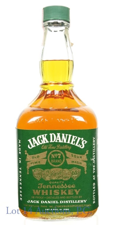 Jack Daniel's Whiskey (Green 86 Pr - 1.75 L): Jack Daniel's No. 7 old time sour mash Tennessee whiskey. - green label. 86 proof. 1.75 liters. ATF Distilled Spirits tax strip (1983 - 1985). "84" embossed on bottom of bottle.