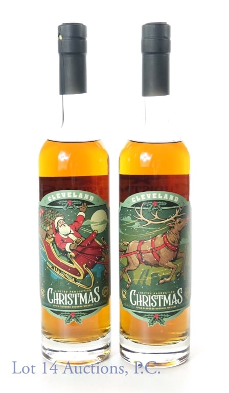 Cleveland Christmas Spice Flvrd Bourbon Whiskey, 2: 2 Cleveland Christmas Spice Flavored Bottles. Limited Production. 86 Proof, 750ml. One bottle's label displays St. Nicholas and other bottle label displays Rudolph.