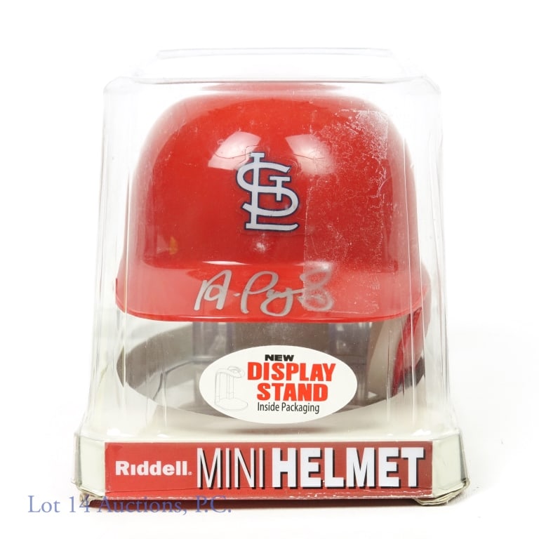 Cardinals Albert Pujols Signed Mini Helmet: Riddell mini helmet signed by Albert Pujols. This helmet has a COA from Authenticated Ink.