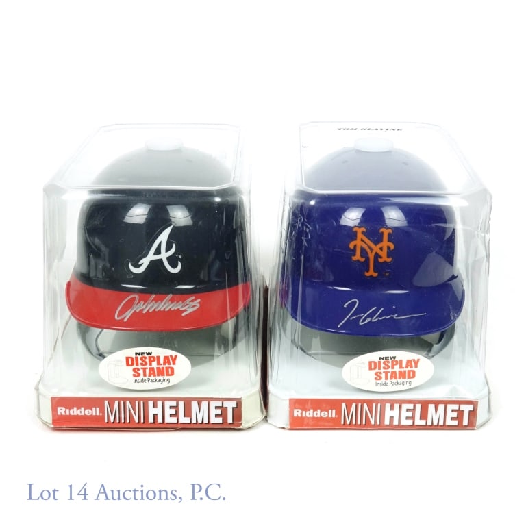 John Smoltz And Tom Glavine Signed Helmets (2): Atlanta Braves mini helmet signed by John Smoltz and a New York Mets mini helmet signed by Tom Glavine. The Smoltz mini helmet has a COA from PSA/DNA and the Glavine mini helmet has a COA from Leaf Au