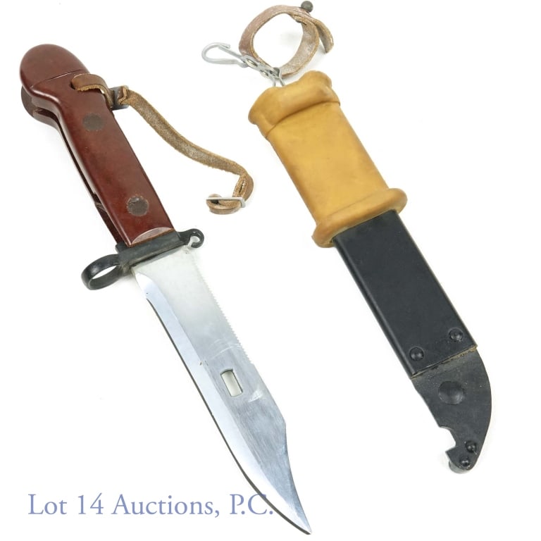 Polish AK-47 Type 3 Bayonet & Scabbard Lthr Hanger: Polish AK-47 Bayonet with matching scabbard. Bakelite handle, leather hanger and rubber wrap. 5.8" blade, 11" overall length, 8.25" scabbard.