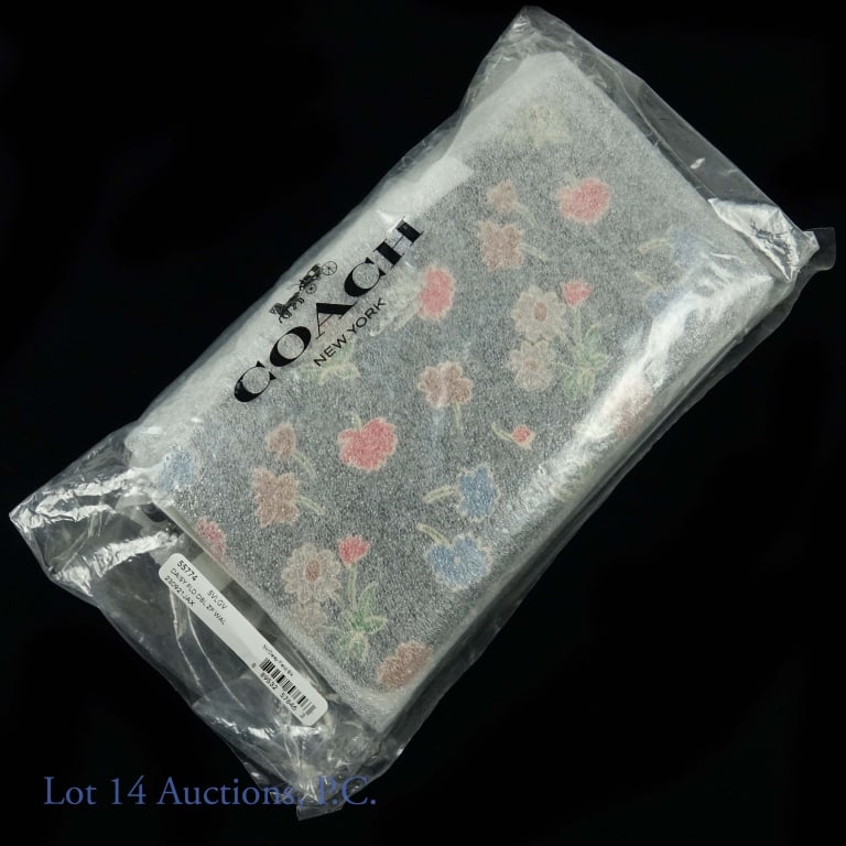 Coach Daisy Field Wristlet Purse NEW: New in package Coach Daisy Field Double Zip Wristlet. # 55774. Never unwrapped.