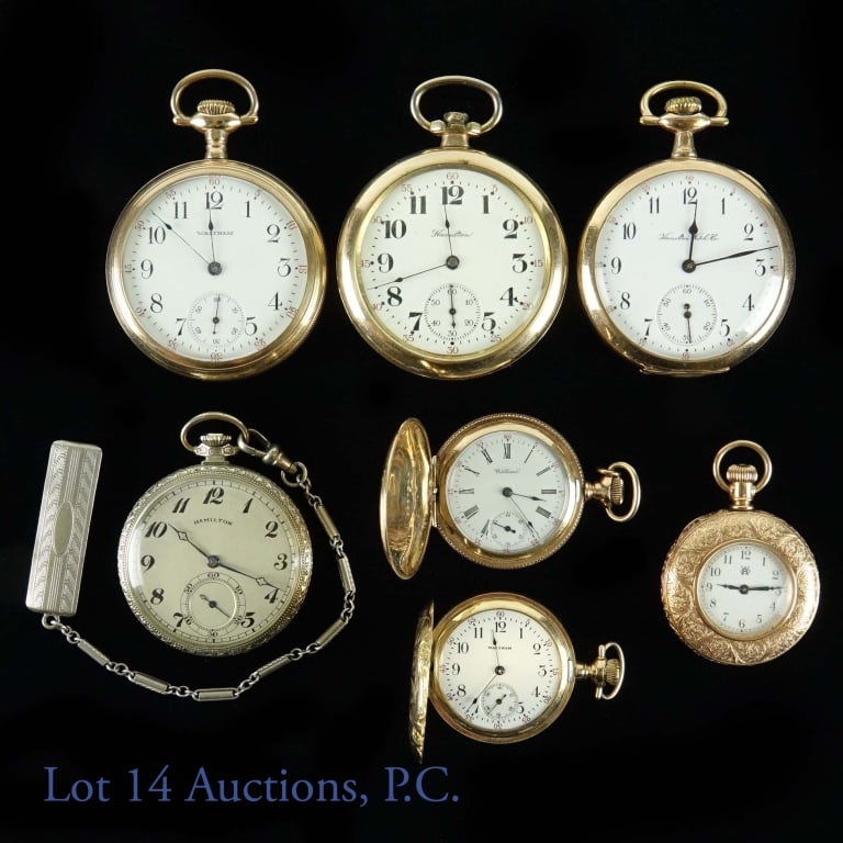 Hamilton and Waltham Pocket Watches (7): Lot of seven vintage pocket watches. Includes: **Hamilton Watch Co. 14K gold-filled (silver-toned) pocket watch w/ fob, serial number: 03365. (running, 1.5" face). **Hamilton pocket watch, gold toned