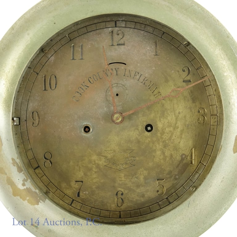 1900 Cook County Infirmary Brass Crosby Gage Clock: Brass clock inscribed "Cook County Infirmary". Crosby Steam Gage & Valve Co. Boston, USA cast brass engine room or mechanical room 8 day clock. Arabic numbers engraved on case brass dial. Some loss to