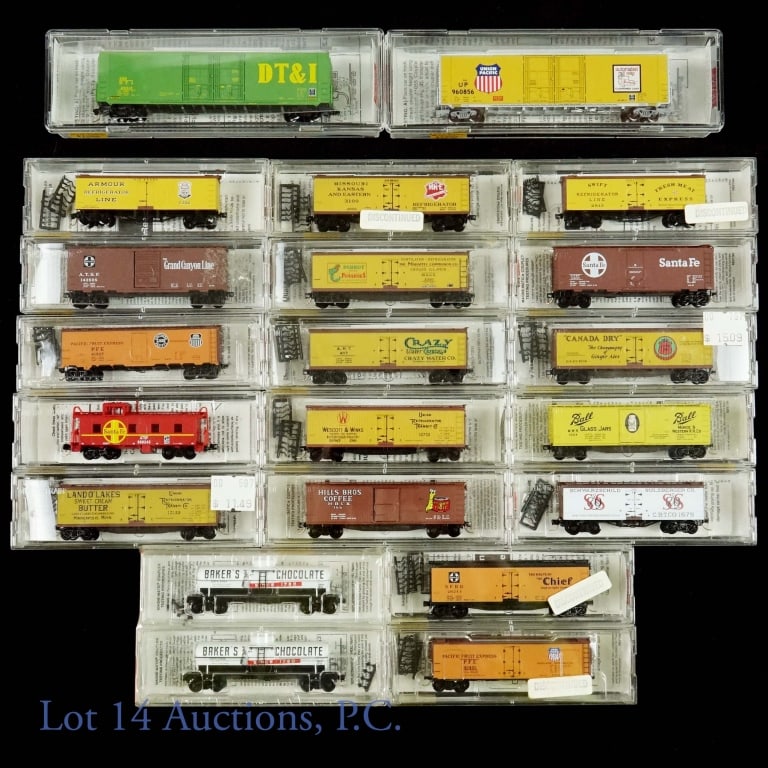 Micro-Trains N Scale Train Cars (20): A total of 20 Micro-Trains N scale train cars. This lot includes: Baker's Chocolate two-pack special run (no catalog number shown), Union Pacific catalog number 102020, Detroit, Toledo & Ironton catal