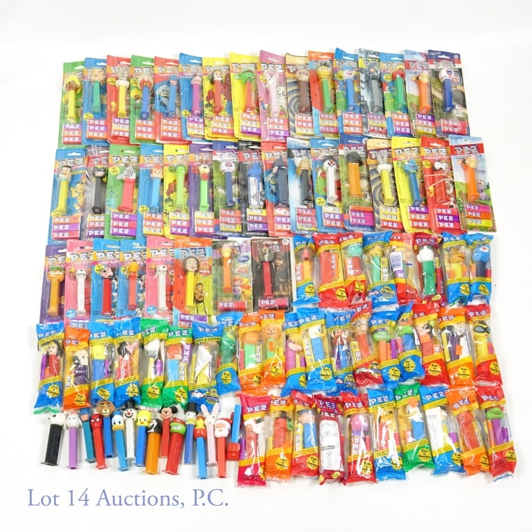 PEZ Dispensers - Individual: 38 PEZ dispensers in plastic bubbles on cardboard backing (some backings are almost or completely loose from bubble. ***** 32 PEZ dispensers in sealed manufacturer plastic bag packaging. ***** 16 loos