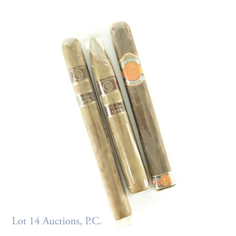 Rocky Patel Cigars (3): 3 Rocky Patel cigars: 1979 vintage (6" long, app. 2.75" circumference) *** 1979 vintage (7" long, app. 2.5" circumference) *** Fifty (6.5" long, app 2.5" circumference). Will be shipped in mylar pouch