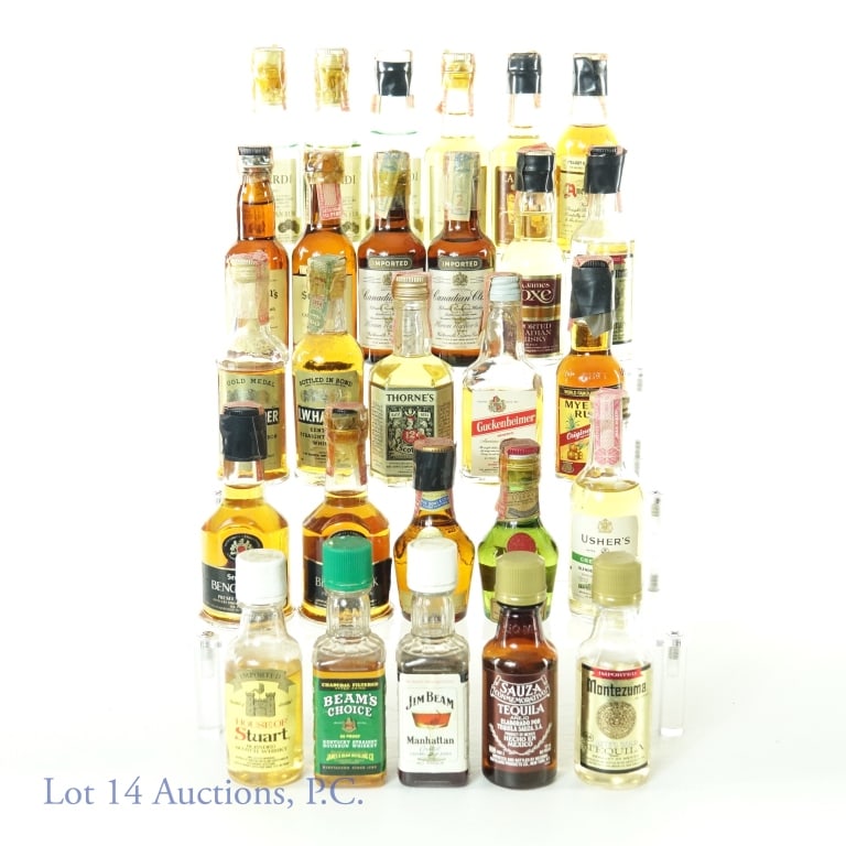 American, Canadian and Scotch Whiskey Minis (27): Twenty-Seven mini bottles of American (10), Canadian (3), Scotch (3), Rum (4), and Tequila (3) Whisk(e)y. Lot includes: Seagram's Benchmark, Ancient Age, Seagram's V.O. and Seven Crown, Canadian Club,