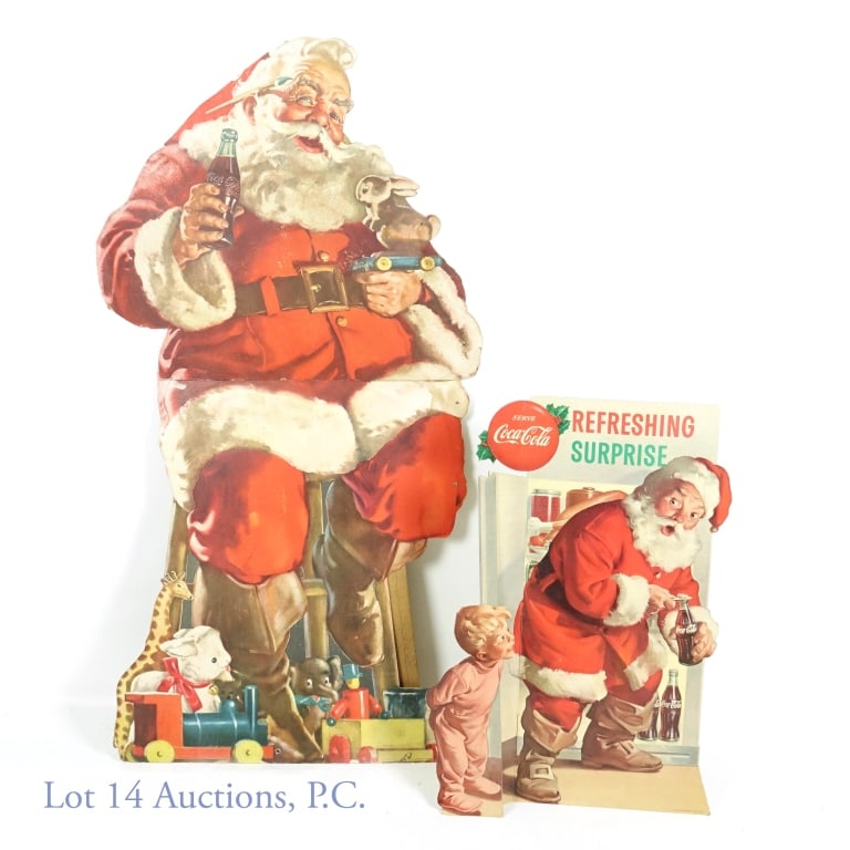 1950s Coca-Cola Stand Up Displays With Santa (2): In 1931 Coca-Cola began using Santa Claus in their Christmas advertising campaigns. The iconic image of Santa enjoying a Coke can still be found today. Offered here are two point of sale stand up disp