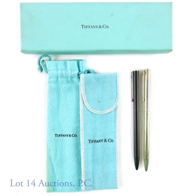 Tiffany & Co. Sterling Silver Pens (2): Two Tiffany and Co. signed sterling silver pens, with 2 T&Co. bags and one box.