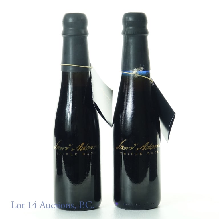 Sam Adams Triple Bock Beer, 1994 (2): Two bottles of Sam Adams Triple Bock Beer, 1994. 8.45 fl. oz. With neck tags.