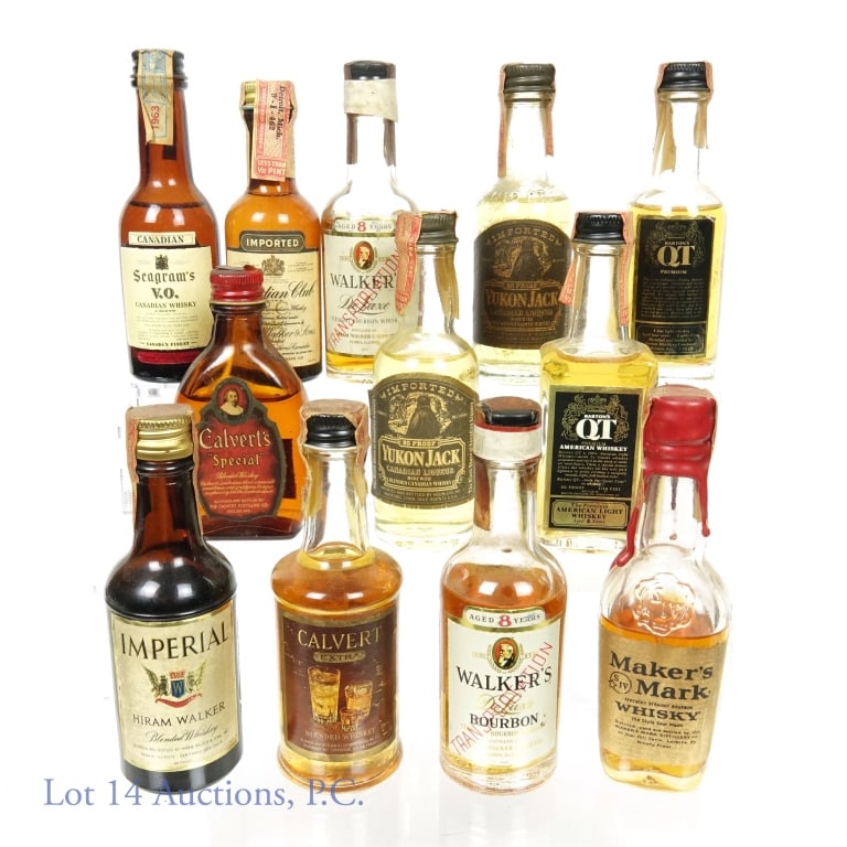 12 Mini Bottles of American & Canadian Whisk(e)y: Twelve mini bottles of American whiskey and Canadian whisky. Yukon Jack, Barton's QT, Hiram Walker Imperial, Seagram's V.O., Canadian Club, Walker's Deluxe, Calvert's Special, and Maker's Mark. Please