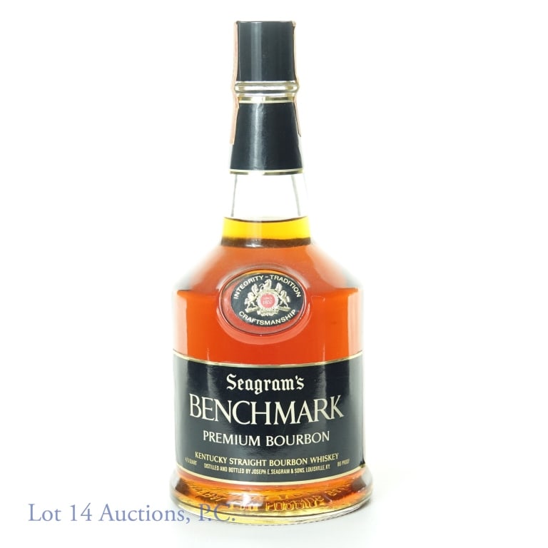 Seagram's Benchmark Premium Bourbon Whiskey: Seagram's Benchmark Premium Bourbon. This Kentucky Straight Bourbon Whiskey is six (6) years old, 4/5 Quart, 86 Proof. Tax seal is in tact.