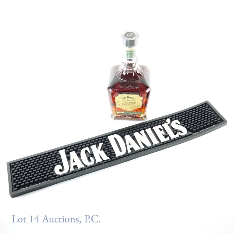 Jack Daniel's Sing Barrel Brrl. Proof Rye + Mat: Jack Daniel's single barrel barrel proof Tennessee rye whiskey. 64.65% ABV (129.3 proof). 750 ml. Barrel No. 23-07343. Barrel House: 2-18Bottling date: 8.18.23. ***** Jack Daniel's branded rubber bar 
