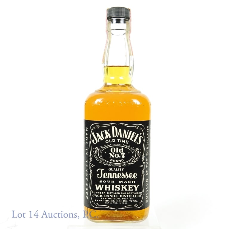 1984 (?) Jack Daniel's Whiskey: Jack Daniel's Old No. 7 Tennessee sour mash whiskey. 90 proof. 750 ml. Non-series ATF tax strip (1983 - 1985). "84" embossed in bottom of glass.