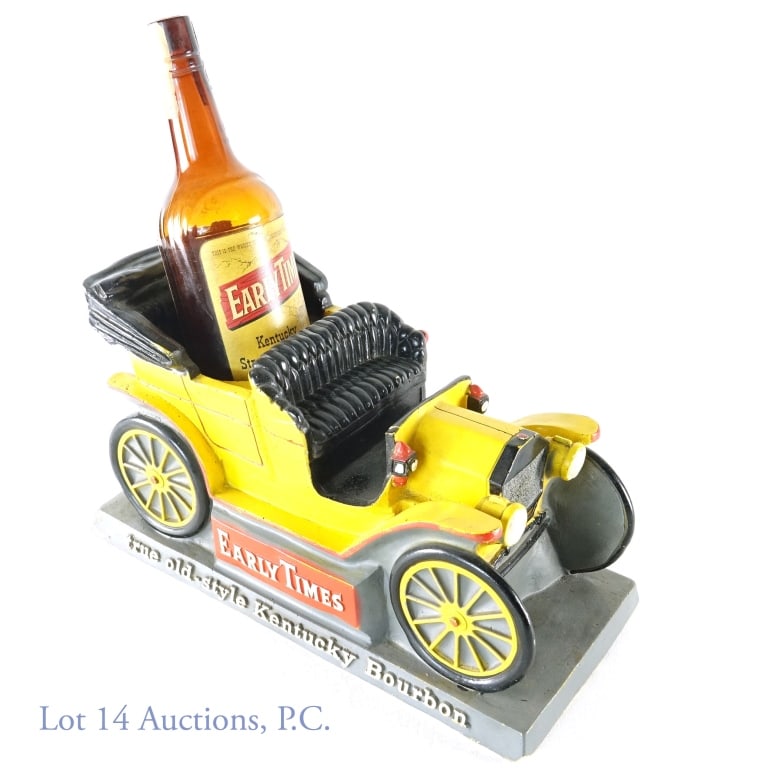 Early Times Bourbon Tin Lizzy Bar Display: Early Times bourbon chalkware 1908 Ford Model T "Tin Lizzy" bar display. Behind car plaque reads: "This is a replica of the 1908 Ford Model T affectionately known to millions as the Tin Lizzie". 13-5/