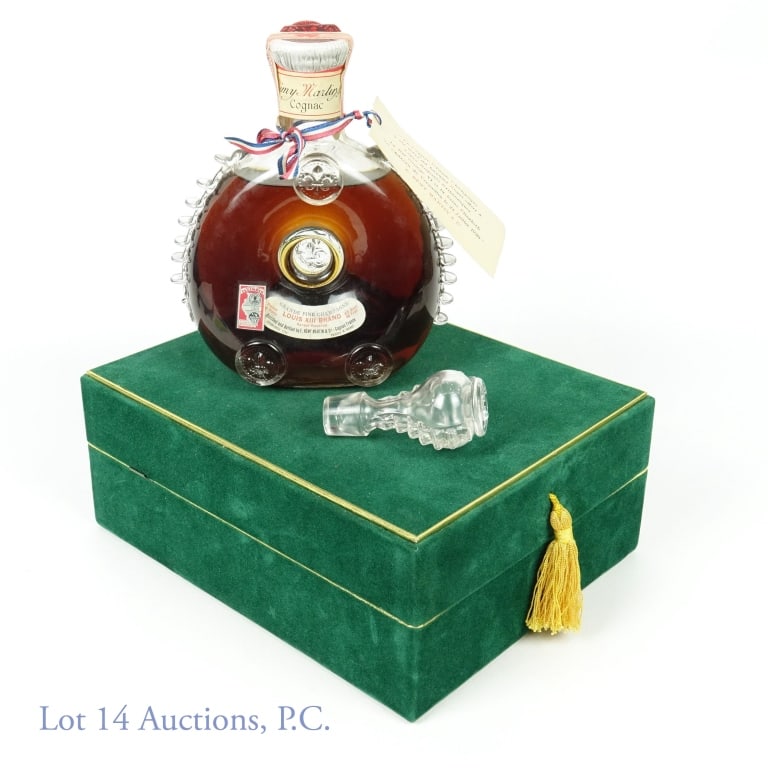 Remy Martin Louis XIII Rarest Reserve Cognac ***: Remy Martin Louis XIII Rarest Reserve Cognac in Baccarat Decanter. 80 proof. 4/5 quart. Series 111 tax strip (1944 - 1960) and Series N Illinois tax stamp. Believed to be early 1950s. Green presentati