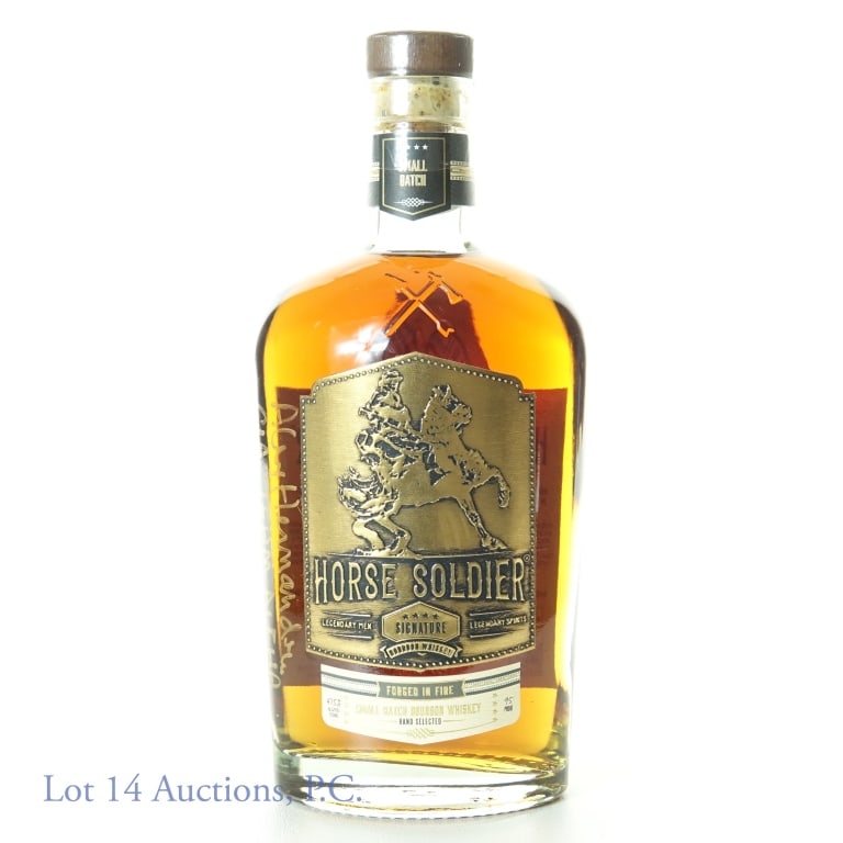 Horse Soldier Bourbon - Signed Alex Hernandez, CIA: Horse Soldier small batch bourbon whiskey. 47.5% ABV (95 proof). 750 ml. American Freedom Distillery. Bottle is signed in gold by Alex Hernandez and inscribed "CIA, Team Alpha". Hernandez was one of t