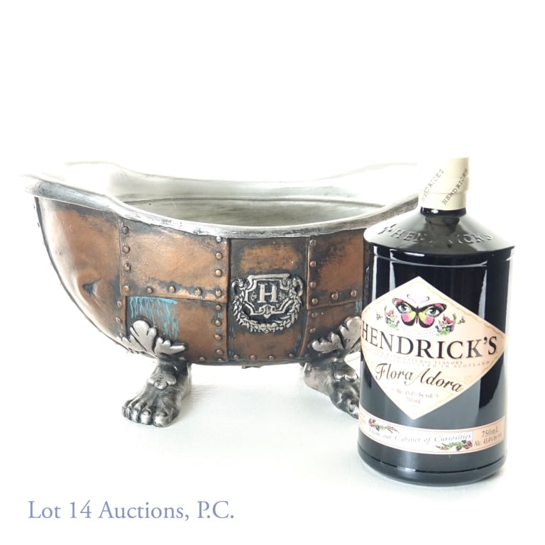 Hendrick's Flora Adora Gin & Bathtub Ice Bucket: Hendrick's gin branded bath tub shaped ice bucket. 13" long x 6.5" tall x 7.25" wide (feet) / 6.75" wide at top of tub. ***** Hendrick's Flora Adora Scottish gin. 43.4% ABV (86.8 proof). 750 ml.