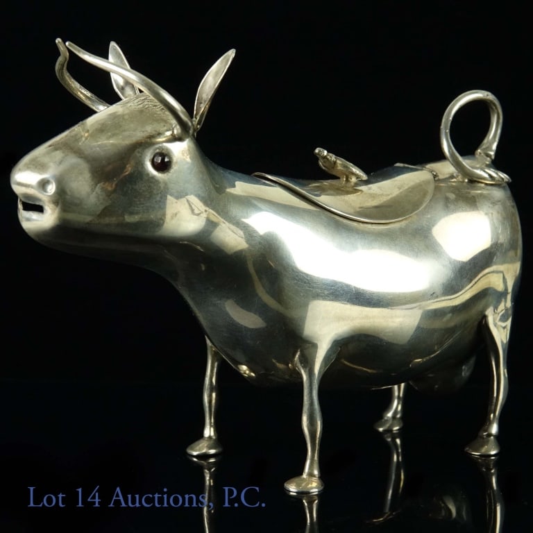 Sterling Silver Cow Creamer - Antique Dutch 835: 1928 Dutch 835 sterling silver cow creamer. With Bee finial on a hinged lid and original ruby color eyes. 146g. Assay marks suggest (HH) H. Hooykaas silversmith in Schoonhoven (Lion II), made in 1928 