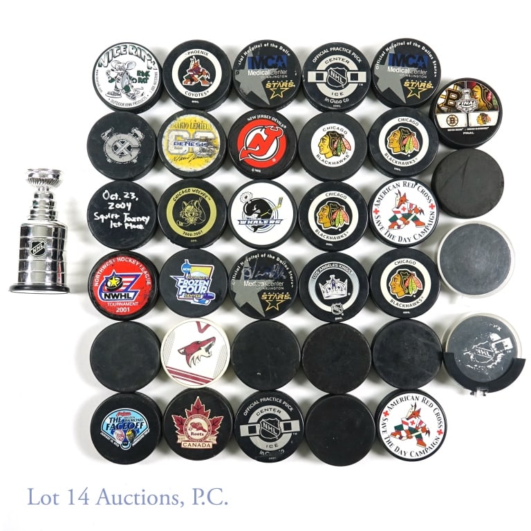 34 Hockey Pucks Some Game Used: From the collection of an avid hockey fan and collector, this is a group of 34 pucks. Some are from NHL games and others are souvenir pucks. Please use the photos to judge the condition of the pucks.
