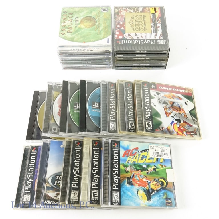 Playstation 1 & Sega Dreamcast Video Games (22): Sony Playstation 1 & Sega Dreamcast Video Games (22 Games Total - 15 PS1 & 7 Dreamcast). Includes (2) Caesars Palace 2000 (PS1), Golden Nugget (PS1), Blast Lacrosse (PS1), RC Racer (PS1), Snowboarding