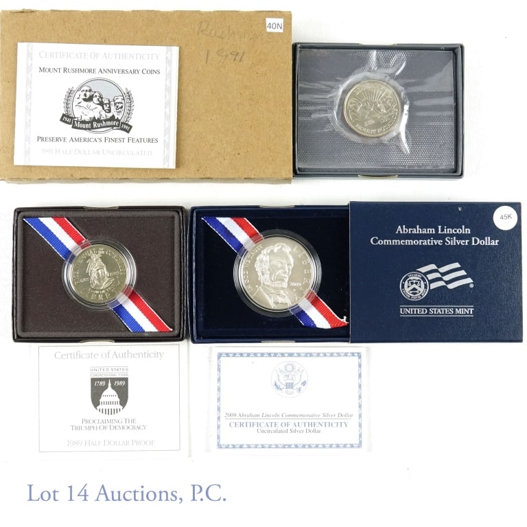 Lincoln/Congress/M Rushmore Silv/Clad Comm Coins: United States Mint commemorative coins in original holders: - 1989-S proof clad half dollar Congressional coin w/ COA, (San Francisco) M=767,897 (1). - 2009-P uncirculated silver dollar A. Lincoln .(P