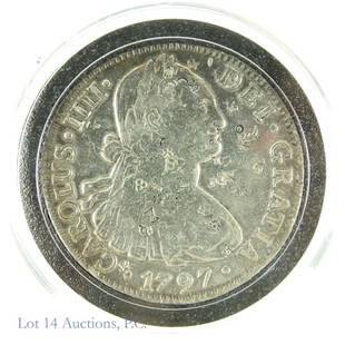 1797 80% Silver 8 Reales (w/Chop Marks): Mexico (Spanish Colony) 1797 8 Reales per consigner surface with chop marks and cleaned/ polished. Housed in plastic round holder and inserted into The Washington Mint blue velvet display case. NGC re