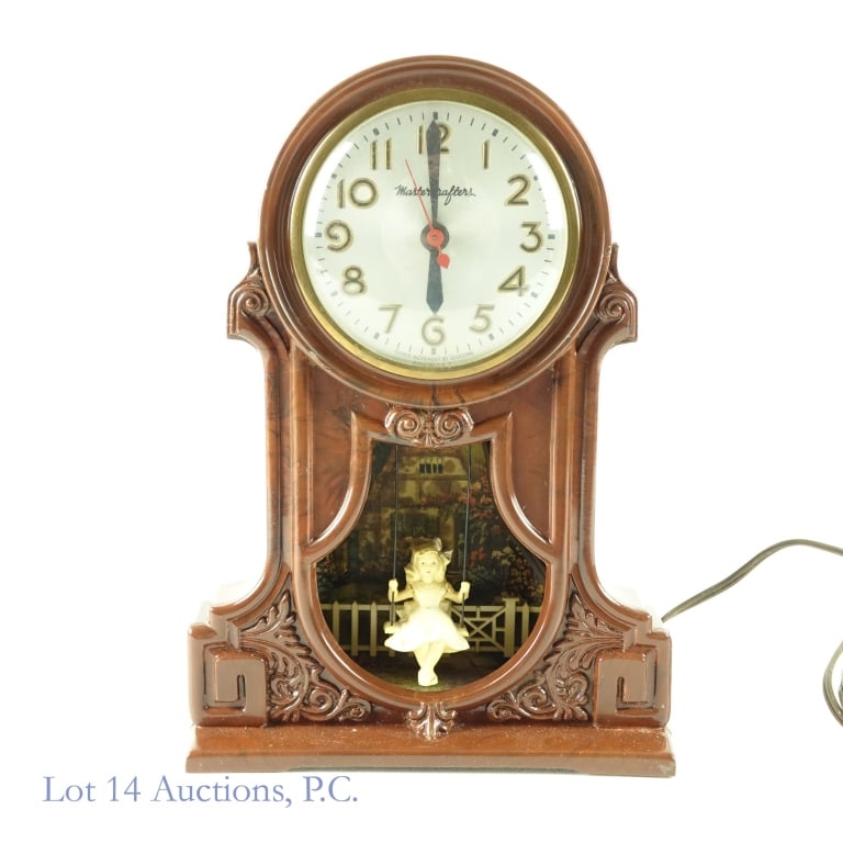 Mastercrafters Electric Clock (Girl Swing): Mastercrafters electric clock. Works! Little girl on swing swings back-and-forth and light works. Body appears to be Bakelite. Approximately 10.25" tall, and 7-3/8" wide. No apparent damage to the Bak