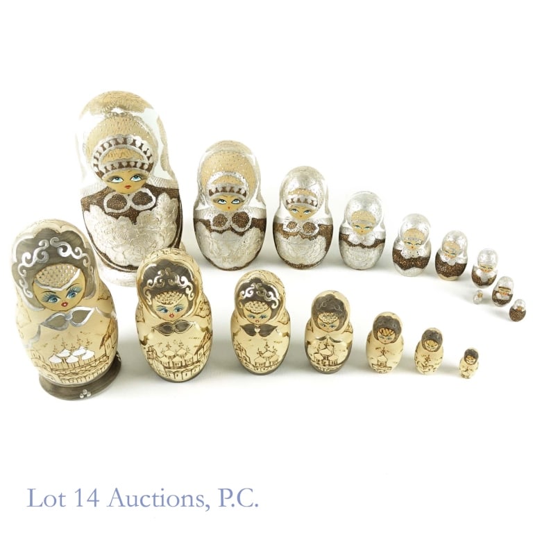 Russian Nesting Dolls - Wood (2): 2 sets of signed Russian nesting dolls - made from wood. The larger of the two sets (largest doll is 9" tall) has 10 nesting dolls total. The shorter of the two (largest doll is 7.5" tall) has 7 nesti