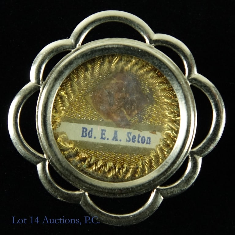 Catholic Reliquary (Elizabeth Seton Relic + Cert): Reliquary from the Roman Catholic Church containing a relic marked for the Blessed Elizabeth Ann Seton (since canonized as St. Elizabeth Ann Seton). Approximately 1.25" diameter. Accompanied by a cert