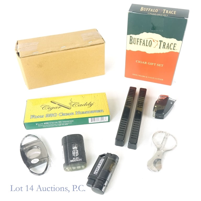 Buffalo Trace Cigar Gift Set & Accessories: Buffalo Trace Cigar Gift Set. Five cigars and custom Buffalo Trace V-cut cigar cutter. Cigars are described as "Barrel aged Piloto Cubano and Nicaraguan long-filler tobaccos are encased inside a Brazi