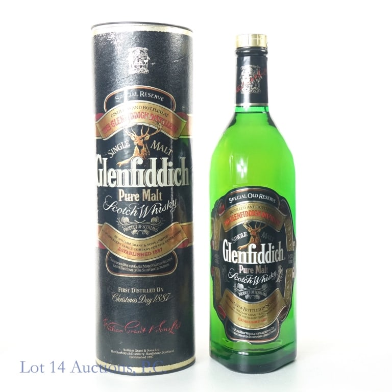 Glenfiddich Special Old Reserve Scotch (1 L): Glenfiddich Special Old Reserve Single Malt Scotch, 86 Proof, 1 Liter, Slight peeling on bottom of front label, Cylinder tube included in fair condition.