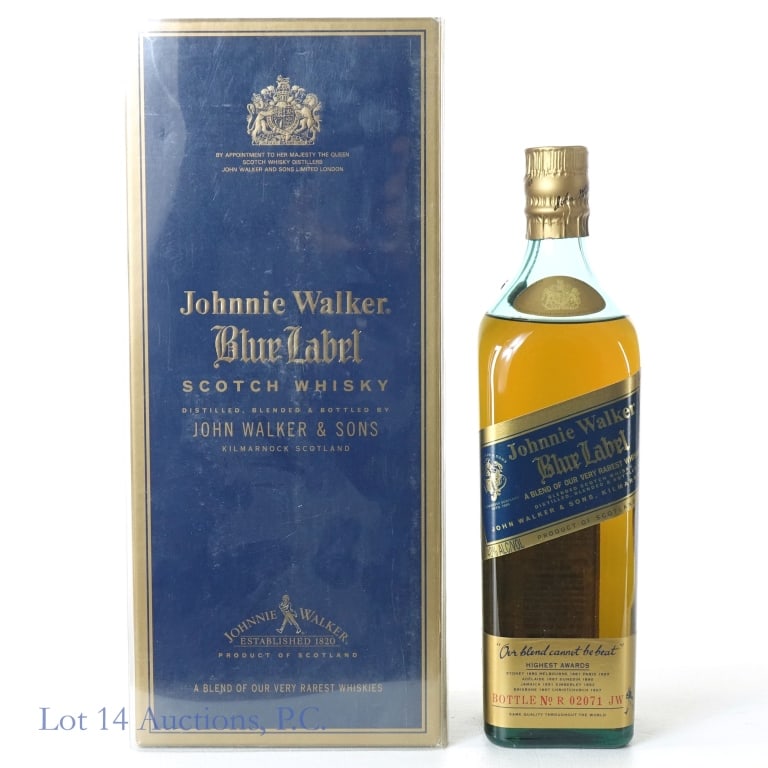 Johnnie Walker Blue Label Scotch Whisky: Johnnie Walker Blue Label blended Scotch whisky ("A Blend of our very rarest whisky"). 40% ABV (80 proof). 750 ml. Bottle No. R 02071 JW. Original box with two booklets and outer plastic sleeve. Box h