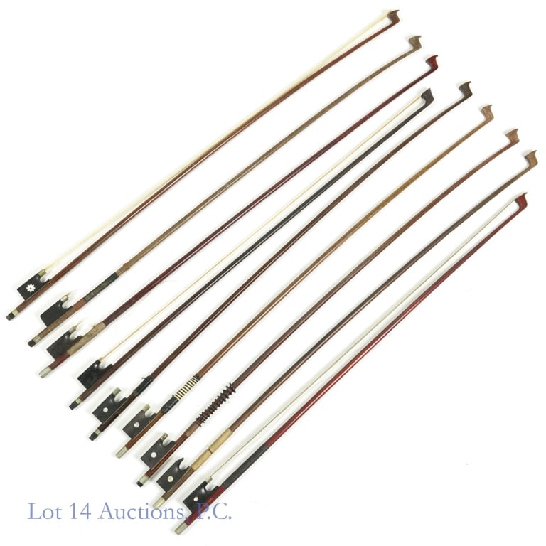 Violin Bows (9): 9 violin bows. Please see photos for condition. Markings on bows:Five (5) frogs have a singular circle. One of which has "made in Japan". One (1) frog has 8 pointed star. Three (3) frogs have no marki