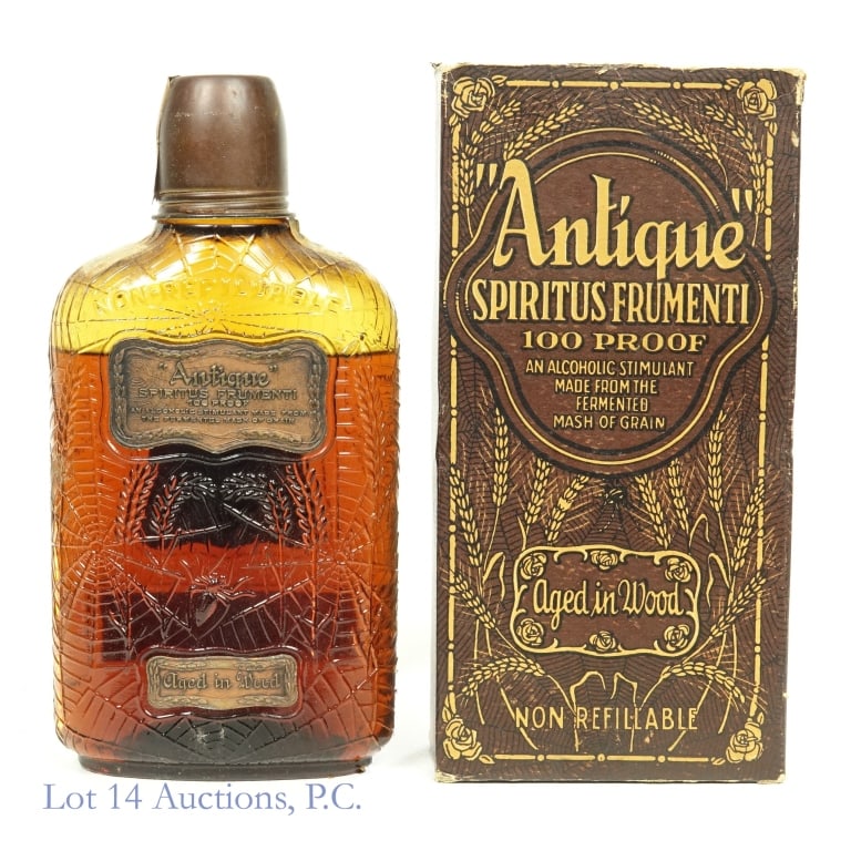 PRE-PRO 1914 Antique Spiritus Frumenti (1 Pint): Antique Spiritus Frumenti, 100 Proof, 1 Pint, Distilled: Spring 1914. Pre-Prohibition Bottle, Filled 1 inch below the shoulder, tax strip disintegrated, capsule remains sealed. Original box included.