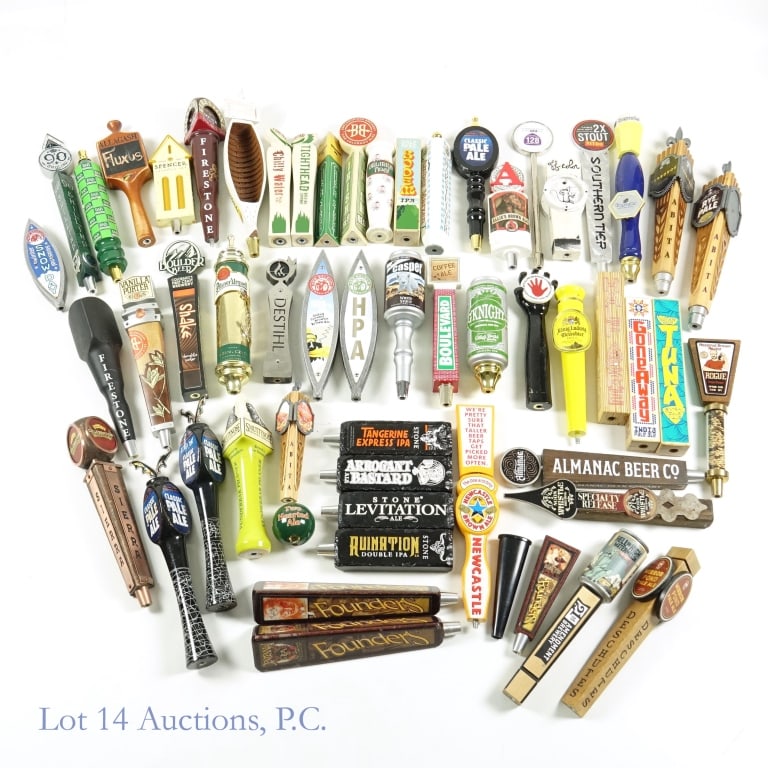 Beer Tap Handles (44): 40 beer tap handles. Condition varies, but all of these came out of a Chicago-area tavern, so there will be signs of use. Please see photos for specifics but some of the highlights: Delirium Noel, War