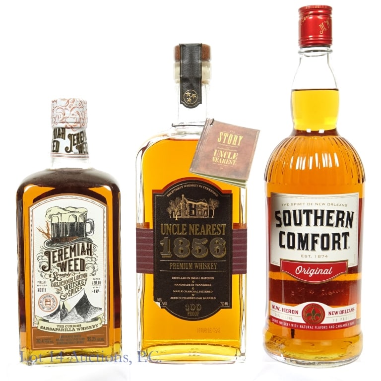 Uncle Nearest Whiskey, Jeremiah Weed, South Com.: Uncle Nearest 1856 small batch Tennessee premium whiskey. 50% ABV (100 proof). 750 ml. Etch: 312 02. Neck tag present. ***** Jeremiah Weed - a Strangely delicious libation of whiskey & spices. 35.2% A