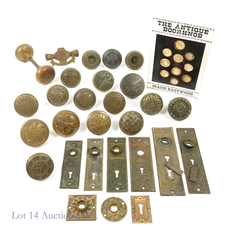 Decorative Doorknobs / Door Hardware + book: Collection of 18 decorative doorknobs - some possibly antique. Condition varies. 10 pieces of door related hardware mostly plates for keyholes and knob insertion points. Just over 9 pounds (4.1 kg) of