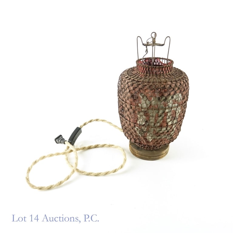 Chinese Cage Lantern - Wired for Electricity: Chinese cage lantern (per consigner, 20th century). wired for electricity. Lantern is approximately 13" tall from bottom of wood base to top of wire frame. Approximately 7" diameter.