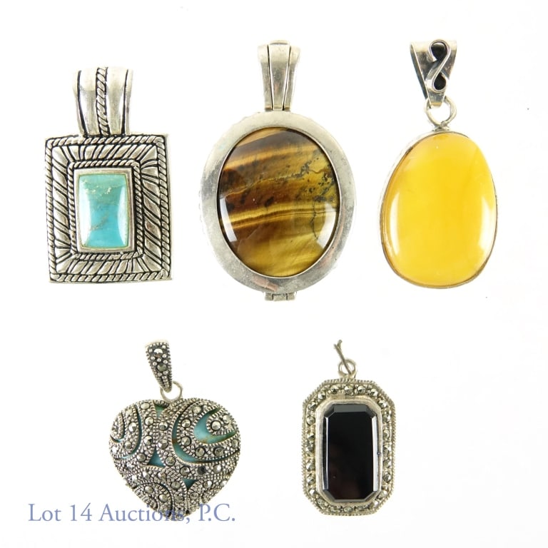 Sterling Silver and Stone Pendants (5): Five sterling silver pendants with stones. Two also have marcacite. Pendant with tiger's eye (or tiger's eye style stone) is hinged and opens, allowing wearer to face either stone forward. 1.3ozt. (37