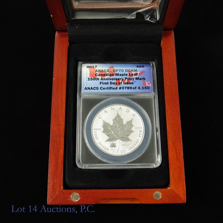 2017 $5 Silver Maple Leaf (ANACS RP70 DCAM): 2017 $5 Canadian maple leaf ANACS graded RP 70 DCAM. 150th Anniversary Privy Mark. ANACS certified "first day of Issue" number 789 of 4,150. Lot comes with First Commemorative Mint COA and wood displa