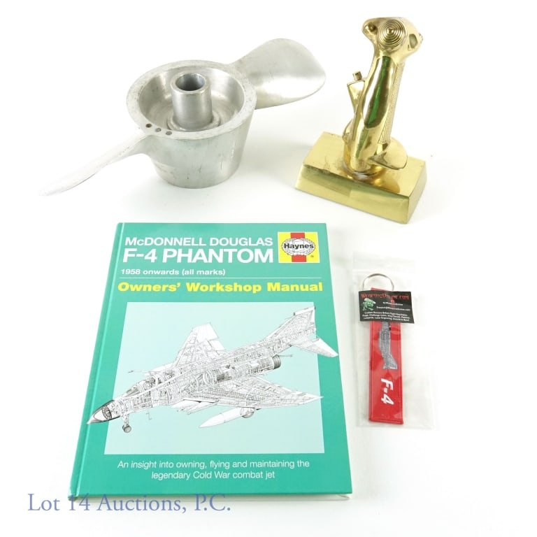 McDonnell Douglas F-4 Phantom Collection: F-4 Phantom brass control stick desk display / paperweight. Base is approximately 5" x 3" x 7.5" tall. Weight: 1.5 pounds (680 grams). *** F-4 Phantom emergency wind generator propeller. S/n 1052. App