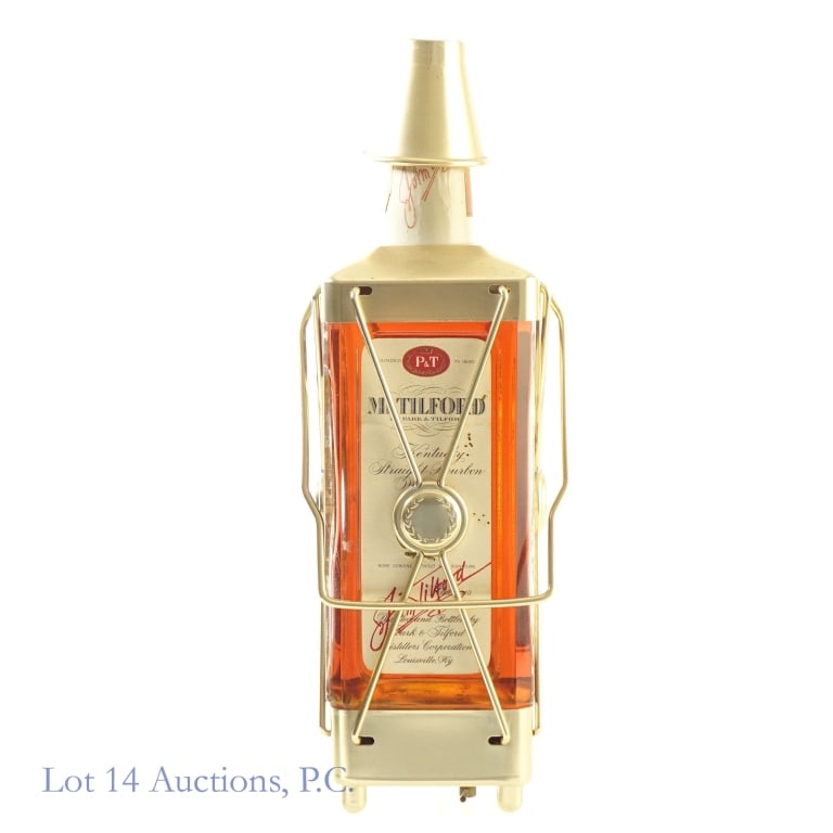 1955 Mr. Tilford Bourbon Music Box Casing*: Mr. of Park & Tilford Bourbon, 86 Proof, 4/5 Quart, Aged: Five Years, 1955, Bottling**** Seal torn underneath cellophane tape, Music box plays the "anniversary song" but does not currently play and wi