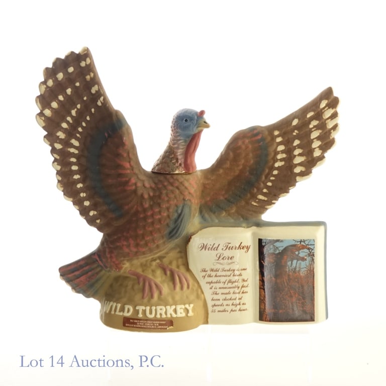 1979 Wild Turkey 8 Yr Bourbon Decanter*: Wild Turkey 8 Year Bourbon Ceramic Decanter, 101 Proof, 750 ml, Wild Turkey Lore Series No.1, Tax strip sealed and in good condition. Decanter currently weighed at 4.87 Ib.***Lot 14 Auctions will only