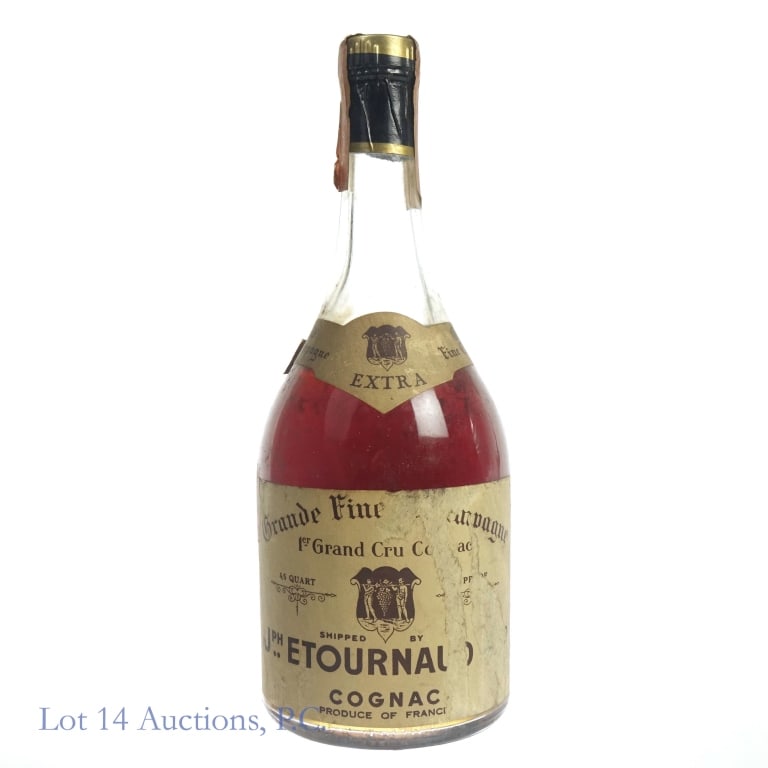 Joseph Etournaud Extra Cognac (1940s/1960s): Joseph Etournaud Extra Grand Fine Champagne Cognac, 84 Proof, 4/5 Quart, "First bottle most likely dates from 1920 to 1925." However, tax strip dates it between early 1940s and 1960. Bottle is likely 