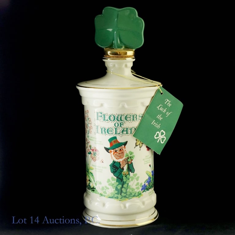 1983 Old Commonwealth 7 Year Flowers of Ireland Bourbon Porcelain Decanter: 1983 Old Commonwealth 7 Year Flowers of Ireland Bourbon Porcelain Decanter, 80 Proof, 750 ml. Collector's Limited Edition Flowers of Ireland. Decanter weighs approximately 4 Ib, 1.3 oz. J.P. Van Winkl