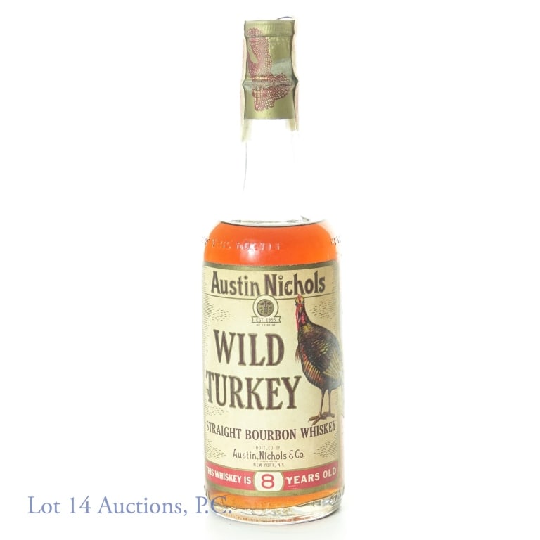 Wild Turkey 8 Year Austin Nichols Bourbon (1960s): (60s/70s) Austin Nichols Wild Turkey straight bourbon whiskey. 8 years. 101 proof. 4/5 quart. Series 112 (Internal Revenue) tax strip. "65" glass molding. New York Marked. Mid-shoulder fill. Tax strip
