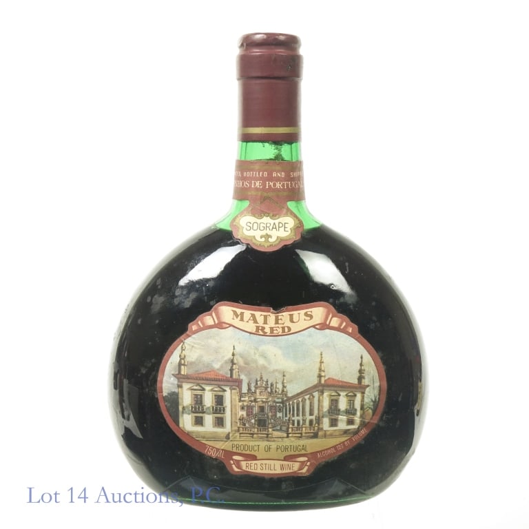 Mateus Red Sogrape Still Wine: Mateus Sogrape Red Still Wine, 12% ABV, 750 ml. Serve Cool. Slight tears in foil seal. Original owner stored wines in basement.
