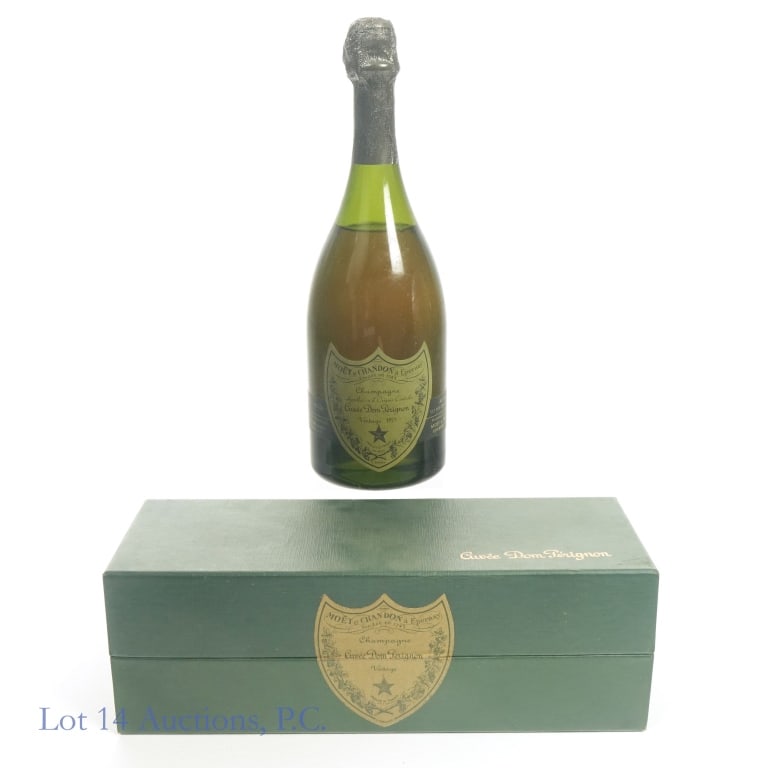1975 Dom Perignon Brut Champagne, 12.7% ABV, 750 ml: Dom Perignon Brut Champagne, 12.7% ABV, 750 ml. Vintage unknown. Was sealed in box. Box seal cut on video - https://youtu.be/dlPx96VU2wQ.